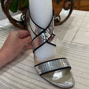 Christian Louboutin, size 41. 100 cm